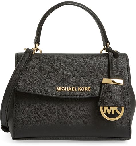 who sells michael kors purses|More.